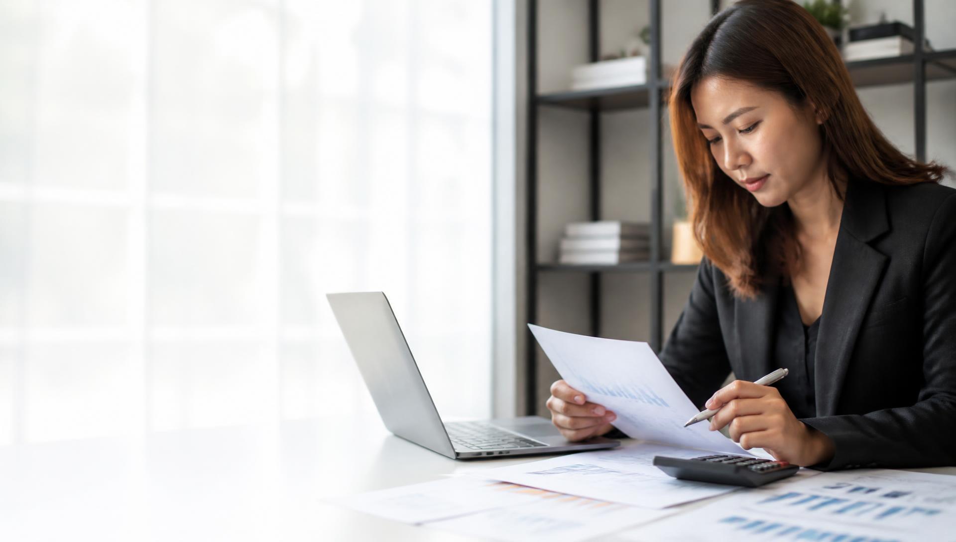 Accountant reviewing financial statements for a CPA Australia skills assessment