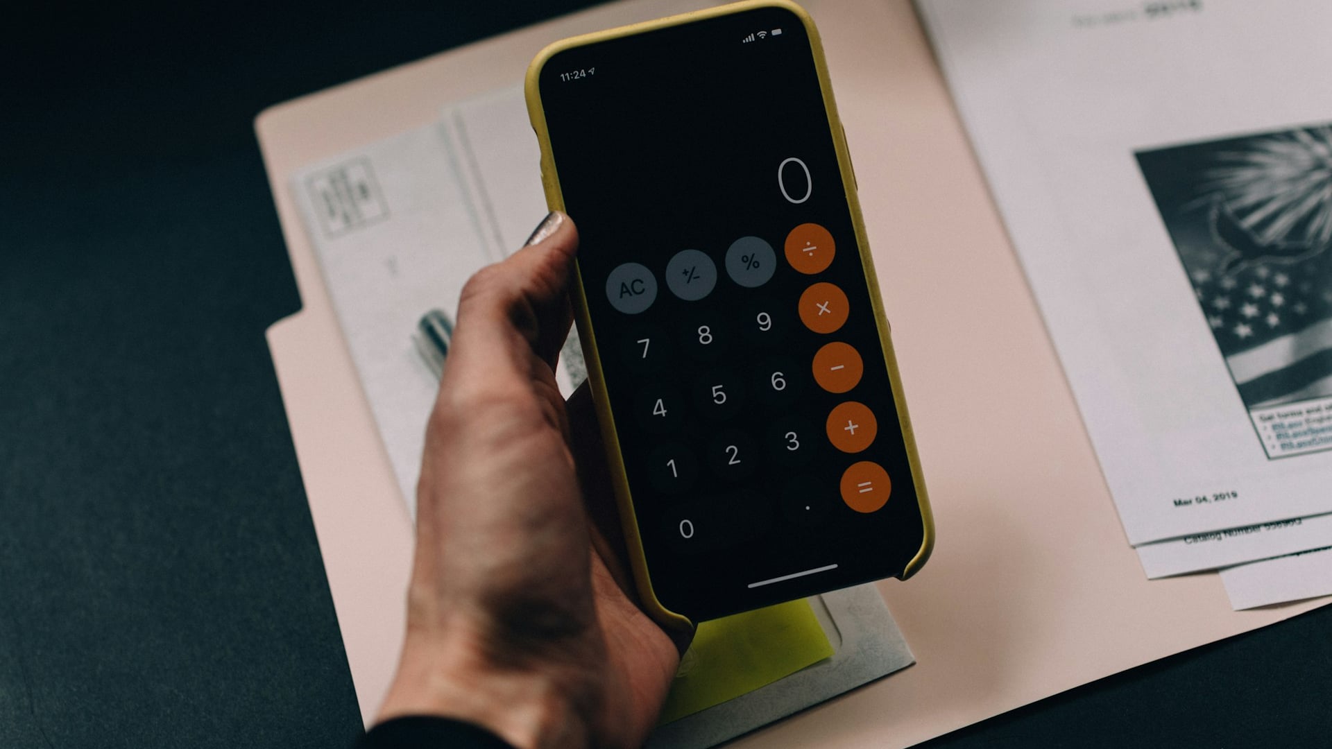 Chartered accountant evaluating balance sheets and taxation reports on a digital tablet for CPA Australia skills assessment