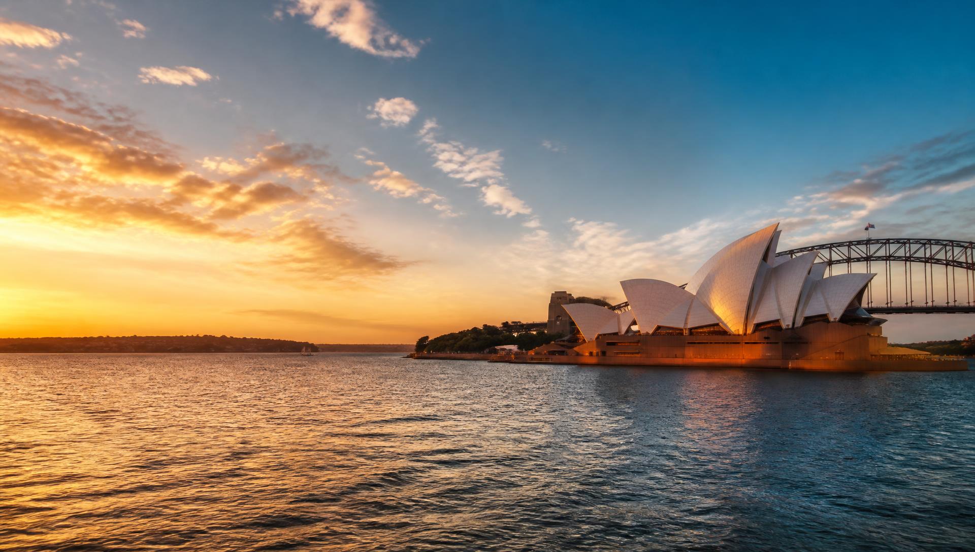 Sydney Opera House and Sydney Harbour Bridge at golden hour